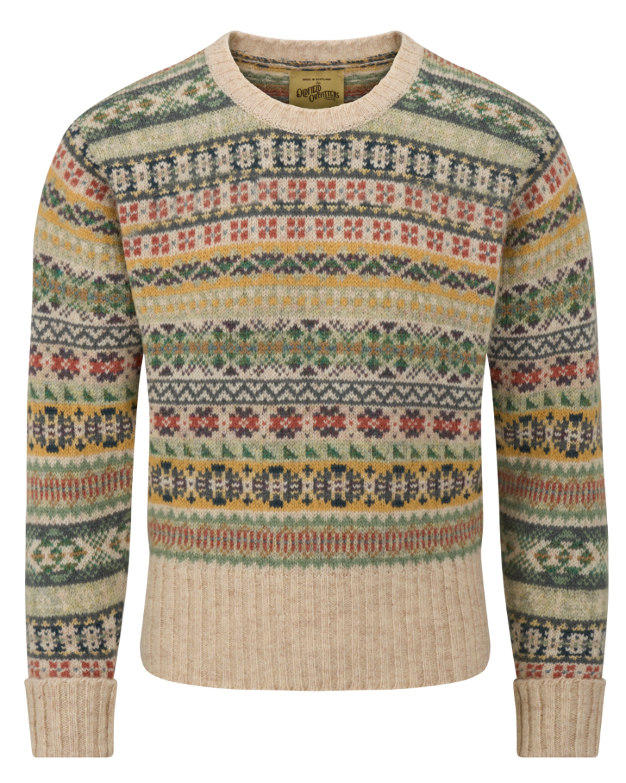 A long-sleeve crewneck knit sweater with a multicolor Fair Isle pattern on a beige ribbed base, shown against a plain white background.
