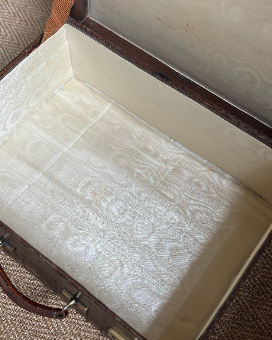 Crocodile case with watermarked silk lining