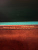 Close-up of a book with 'New Bonhams London' and 'Finnigan's Makers' text on the spine.