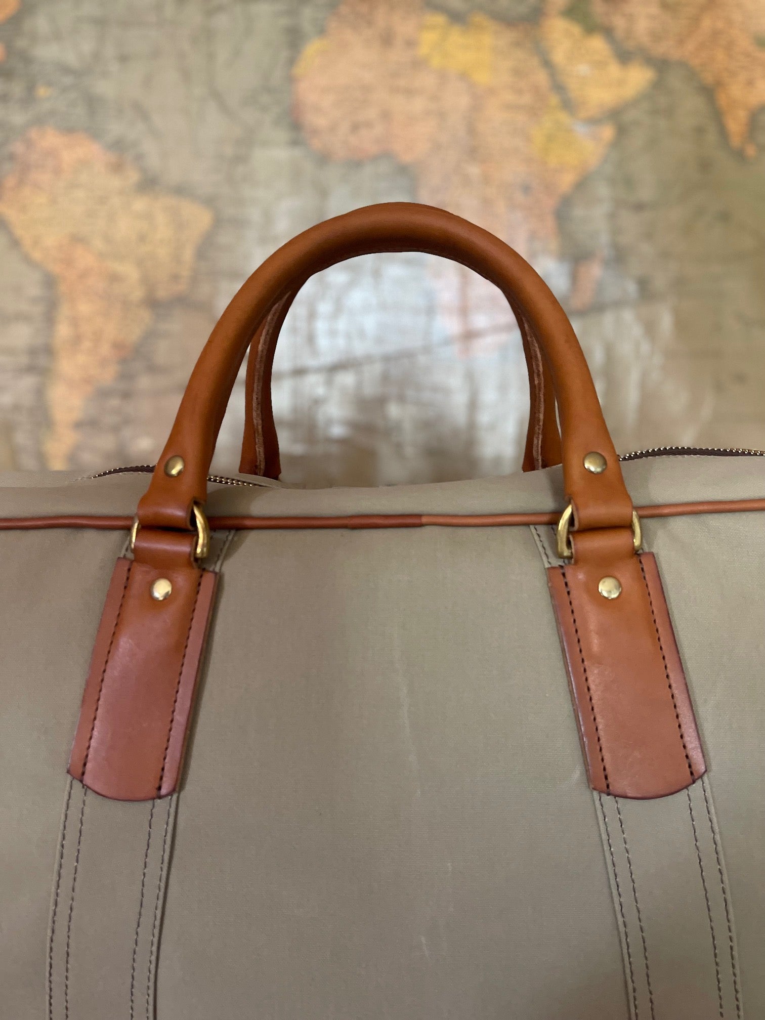 LEATHER AND BRASS DETAIL