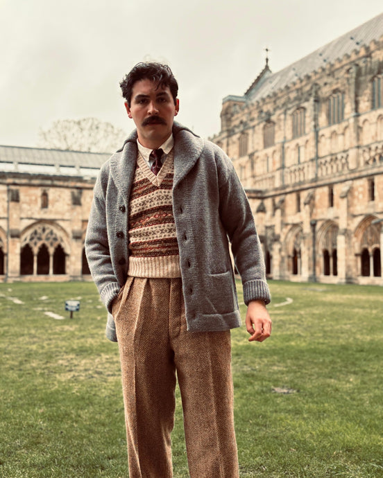Brown and cream patterned Fair Isle sleeveless tank top with a v-neck.