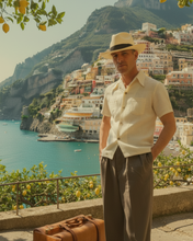 Man in a 1930s Oldfield Outfitters short-sleeved linen shirt, Made in England.