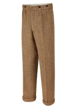 Herringbone tweed trousers, with brace buttons, made in England.