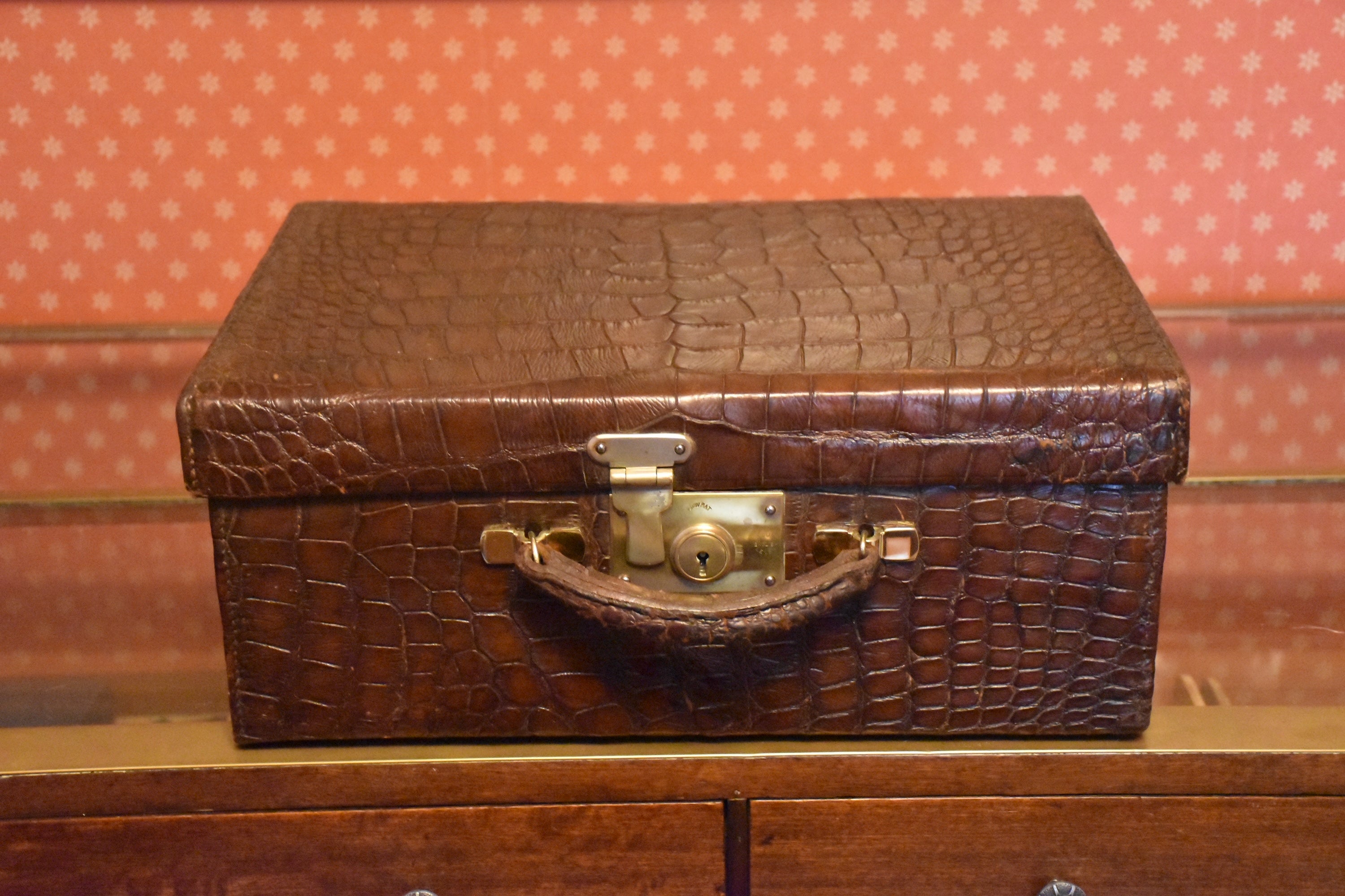 crocodile leather suitcase